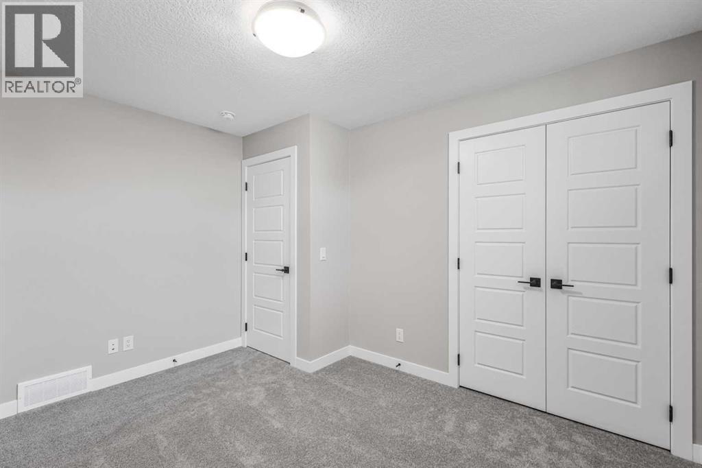 423 Hotchkiss Manor, Calgary, Alberta  T3S 0N3 - Photo 43 - A2283550