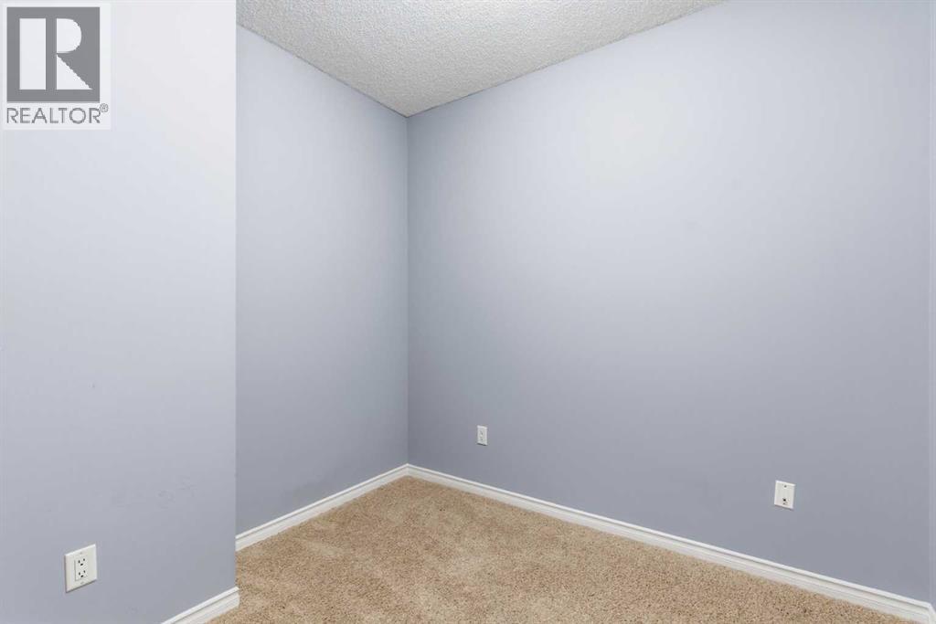 1302, 1010 Arbour Lake Road Nw, Calgary, Alberta  T3G 4Y8 - Photo 7 - A2273131