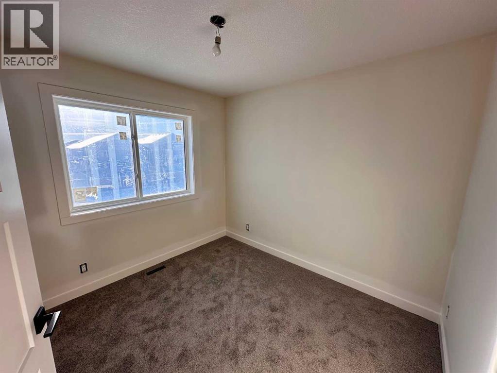 80 Oxford Boulevard, Penhold, Alberta  T4E 1X4 - Photo 24 - A2271899