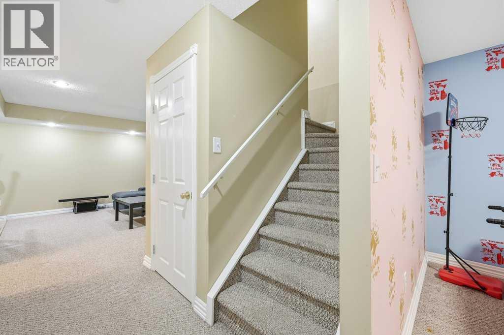 1009 Country Hills Circle Nw, Calgary, Alberta  T3K 4W7 - Photo 28 - A2279886