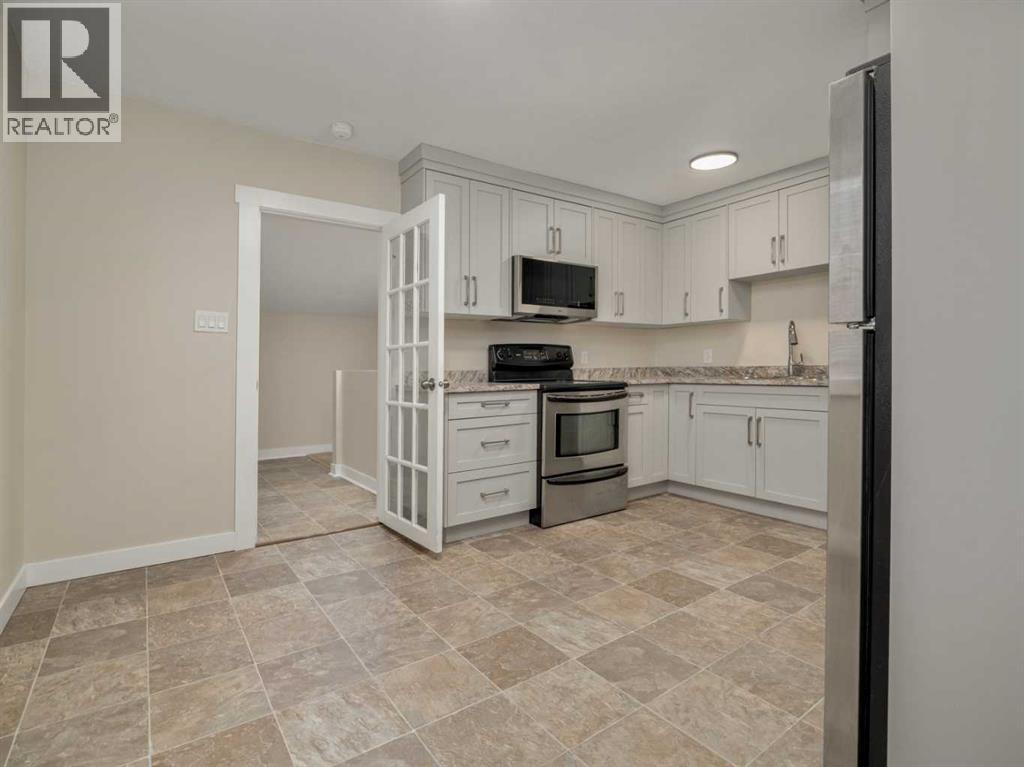 957 12 St  S, Lethbridge, Alberta  T1J 2S8 - Photo 6 - A2282726