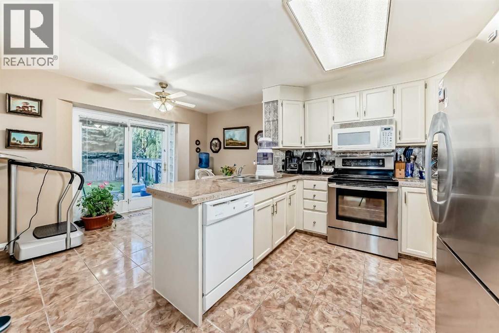 983 Woodbine Boulevard Sw, Calgary, Alberta  T2W 4A7 - Photo 7 - A2255928