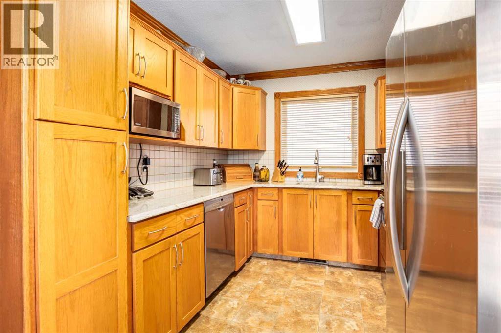 21 Midridge Green Se, Calgary, Alberta  T2X 1C9 - Photo 9 - A2278195