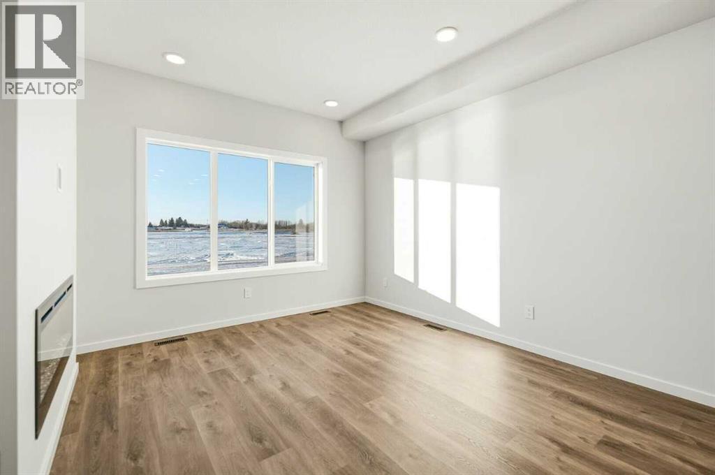 147 Lincoln Crescent, Rural Red Deer County, Alberta  T4E 3E5 - Photo 4 - A2270235