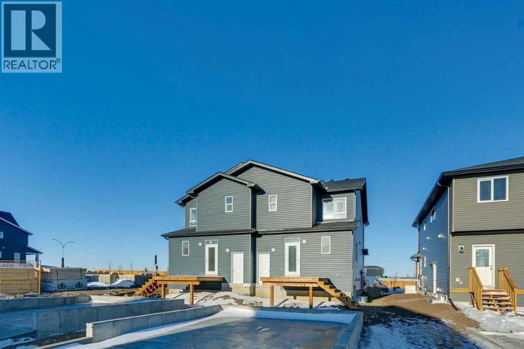 117 Bridgeport Gate Sw, Chestermere, Alberta  T1X 3E5 - Photo 3 - A2276434