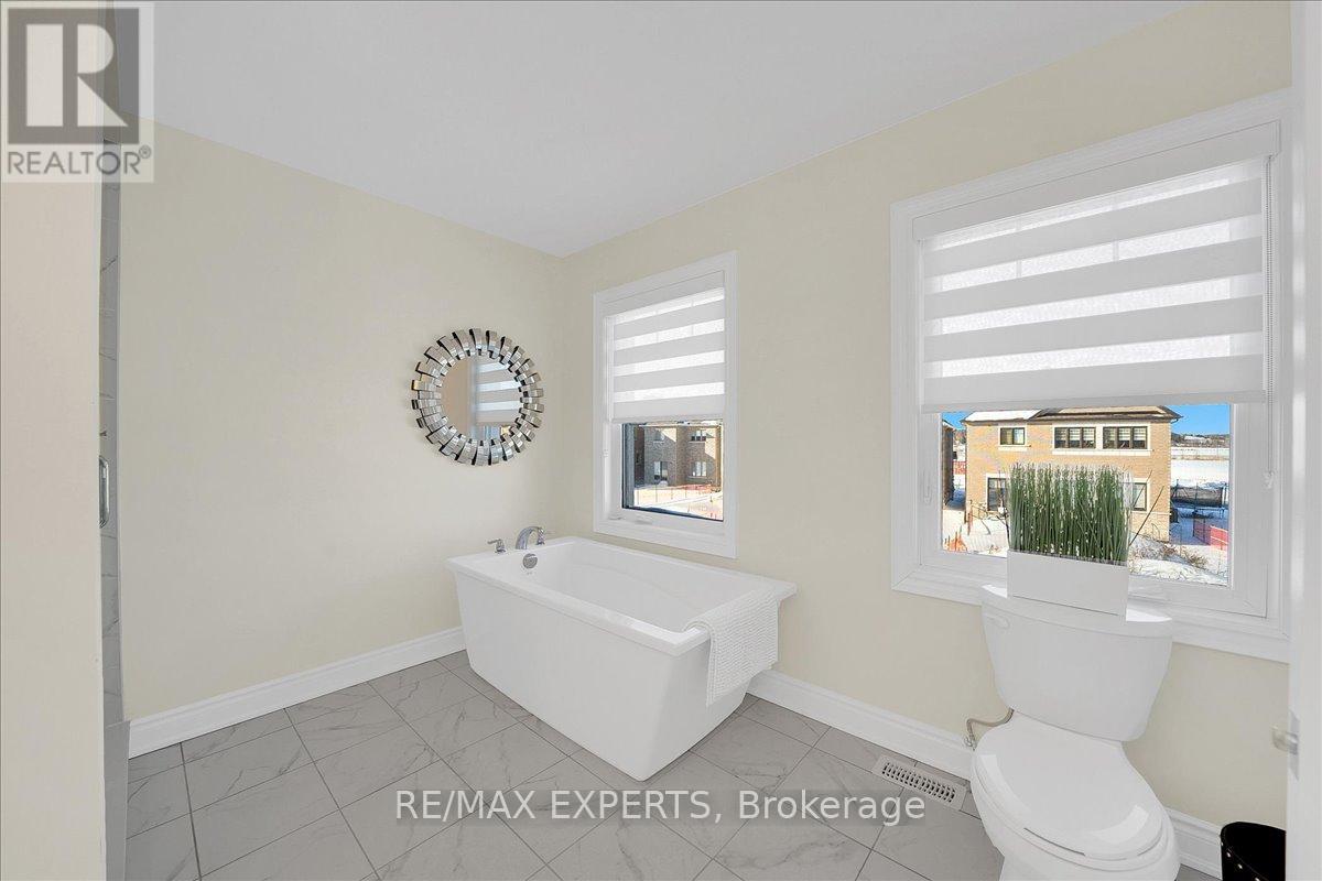 42 Lorne Thomas Place, New Tecumseth, Ontario  L9R 0T8 - Photo 33 - N12762384