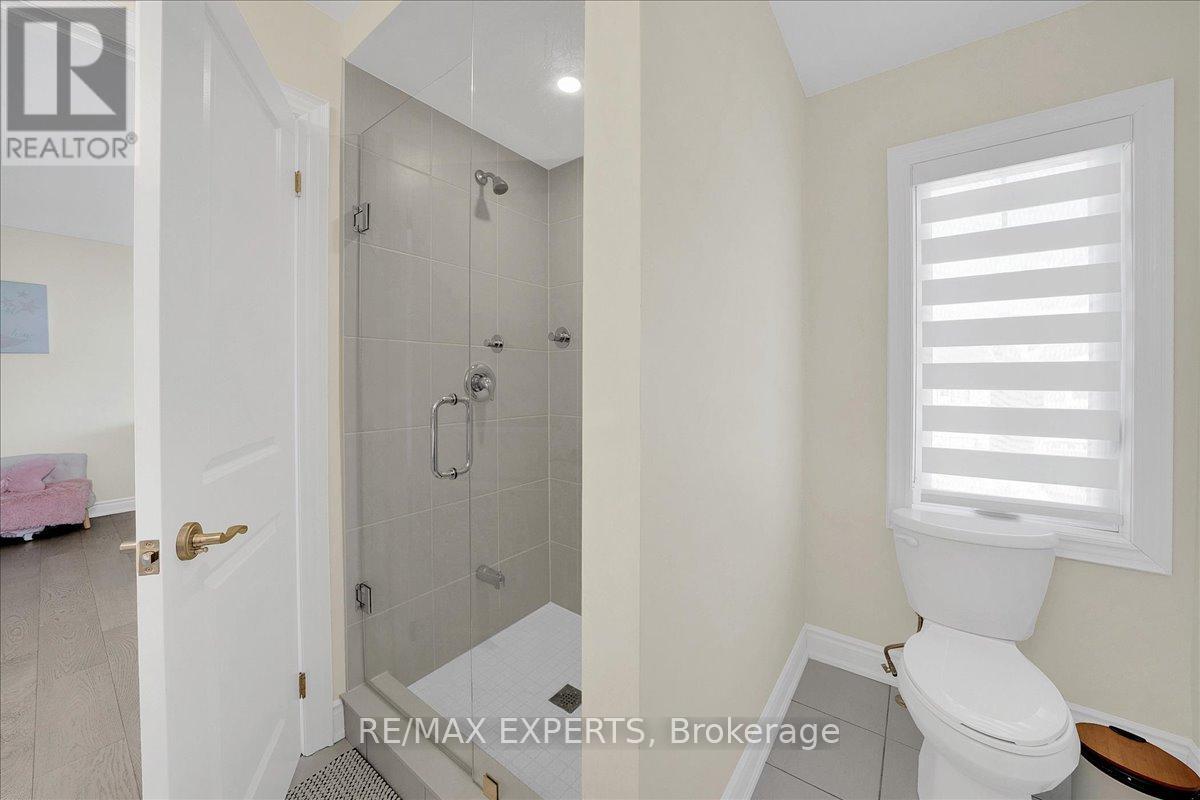 42 Lorne Thomas Place, New Tecumseth, Ontario  L9R 0T8 - Photo 38 - N12762384