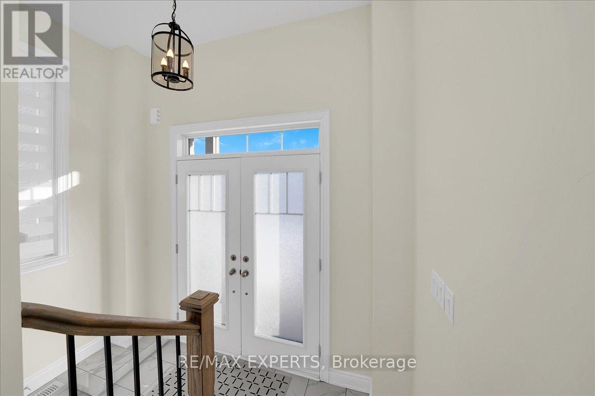 42 Lorne Thomas Place, New Tecumseth, Ontario  L9R 0T8 - Photo 4 - N12762384