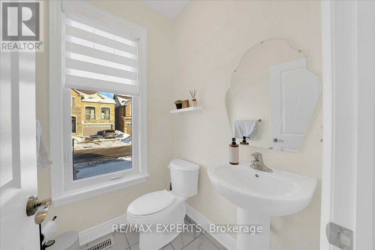 42 Lorne Thomas Place, New Tecumseth, Ontario  L9R 0T8 - Photo 6 - N12762384