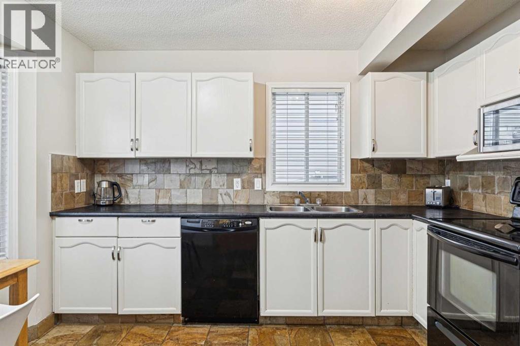 206 Cedarwood Park Sw, Calgary, Alberta  T2W 5T6 - Photo 8 - A2278494