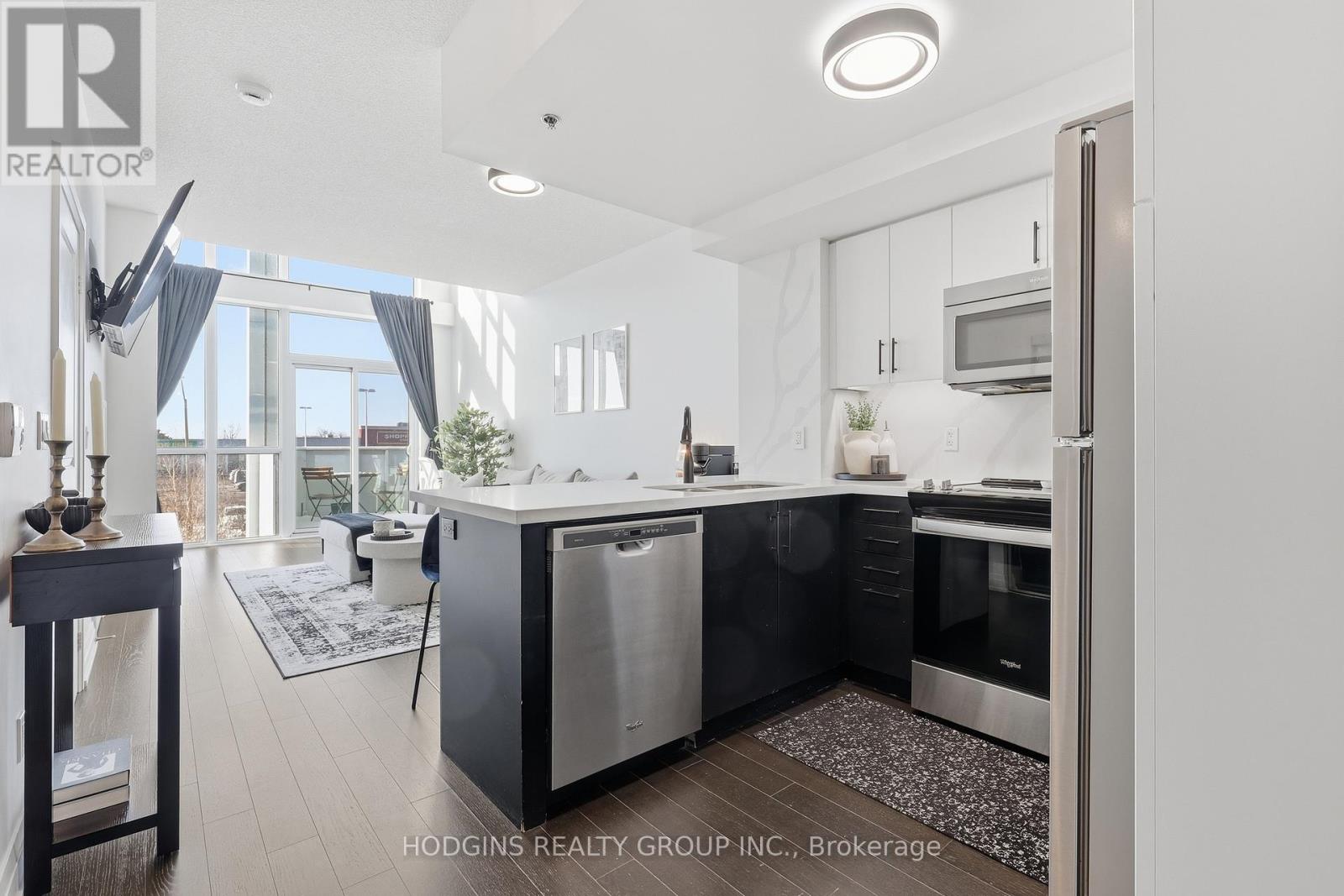 214 - 65 Speers Road, Oakville, Ontario  L6K 0J1 - Photo 3 - W12762998