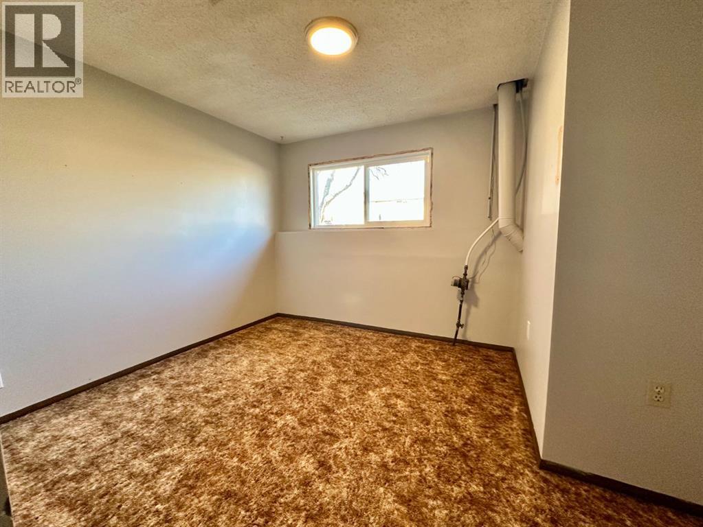 92 Dr. Anderson Park Street, Brooks, Alberta  T1R 0K5 - Photo 24 - A2279018