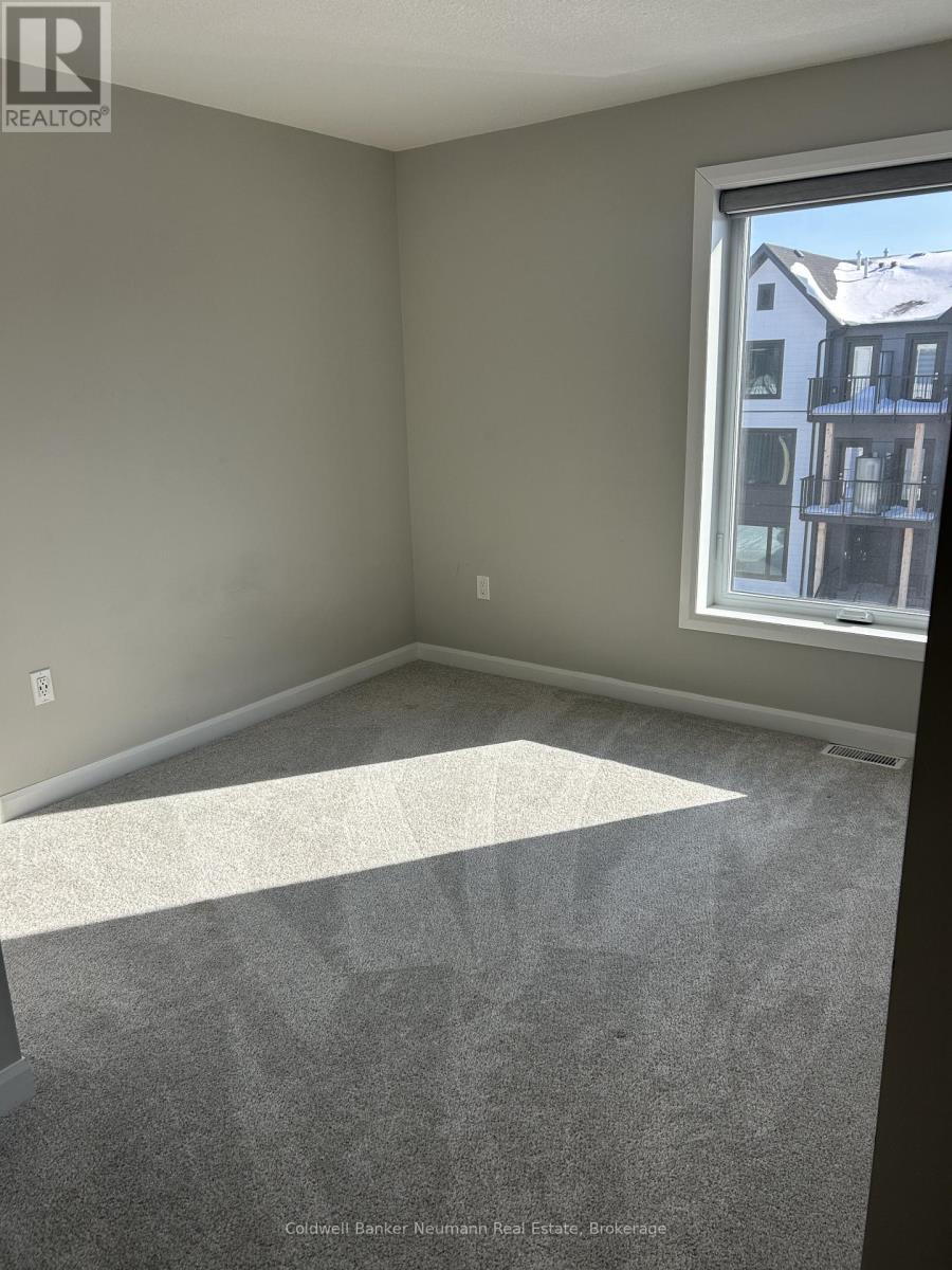 406 - 708 Woolwich Street, Guelph, Ontario  N1H 3Z1 - Photo 2 - X12763466