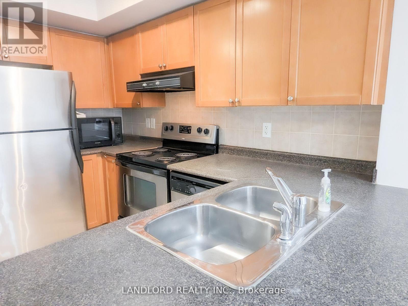 91 - 65 Turntable Crescent, Toronto, Ontario  M6H 4K8 - Photo 2 - W12763746