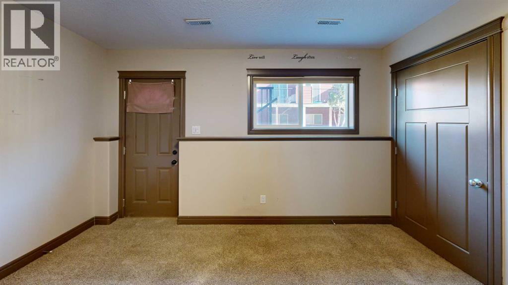 833 Mt Sundance Manor W, Lethbridge, Alberta  T1J 1X5 - Photo 4 - A2284361