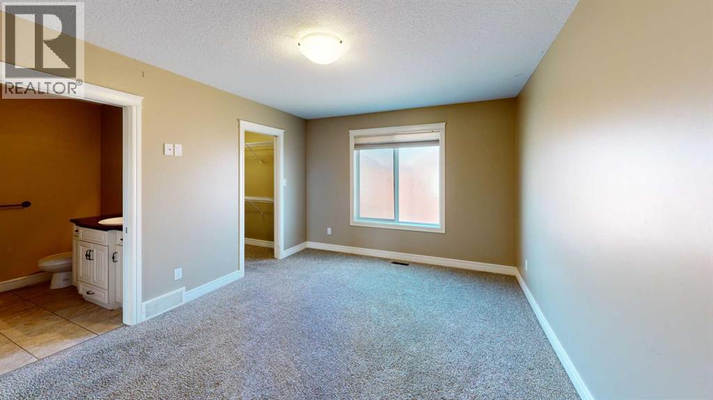 855 Mt Sundance Manor W, Lethbridge, Alberta  T1J 1X5 - Photo 5 - A2284366