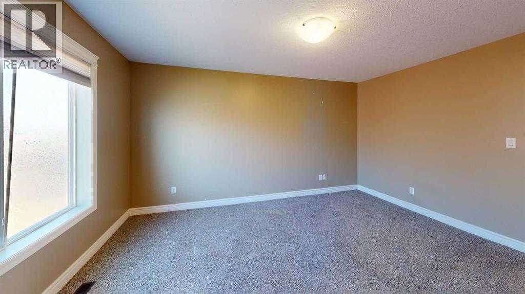 855 Mt Sundance Manor W, Lethbridge, Alberta  T1J 1X5 - Photo 8 - A2284366