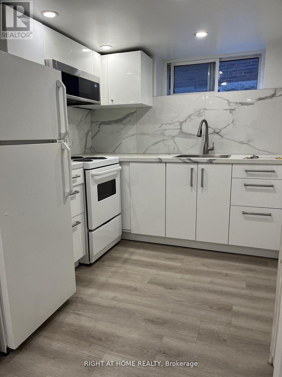 11 Rivercrest Road, Toronto, Ontario  M6S 4H4 - Photo 2 - W12764176