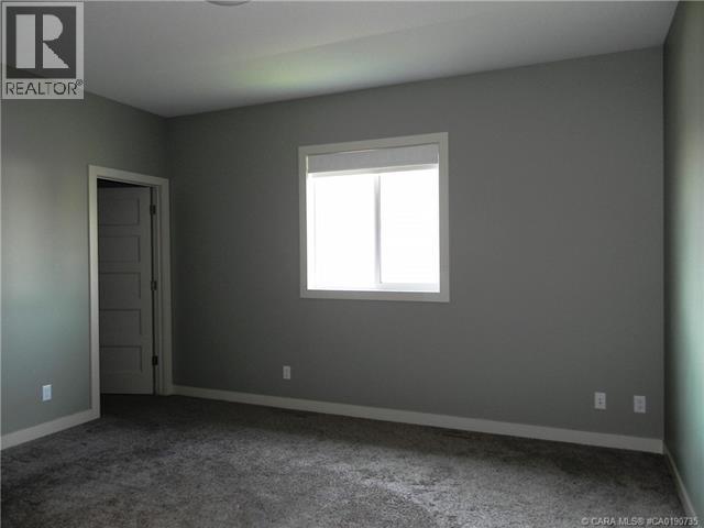 18 Cross Street, Lacombe, Alberta  T4L 0J4 - Photo 12 - A2282747