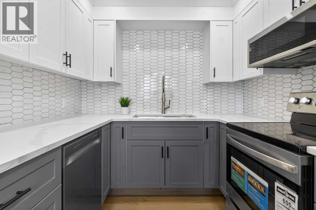 8, 14736 Deerfield Drive Se, Calgary, Alberta  T2J 5Y1 - Photo 9 - A2281267