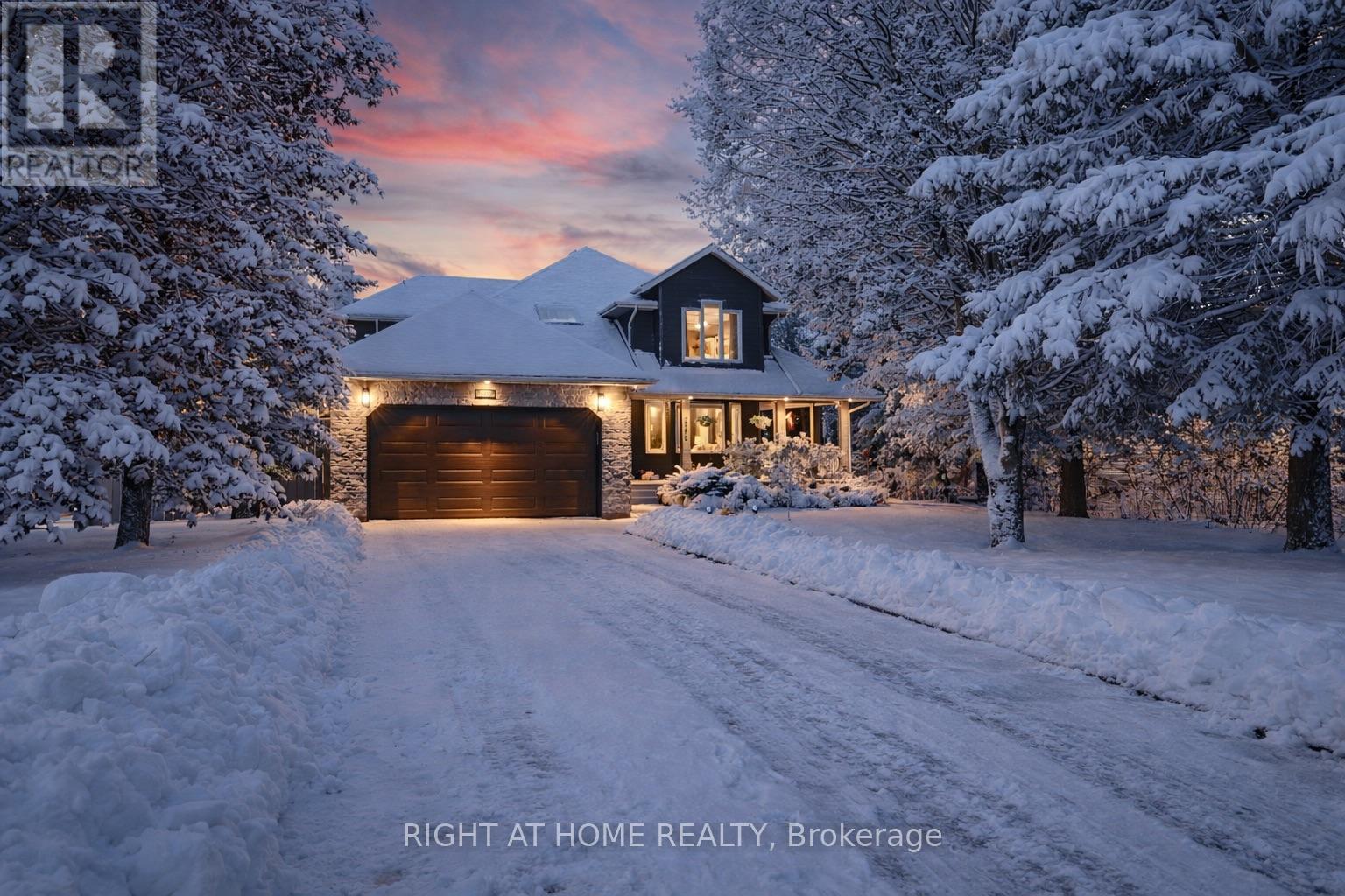 From the moment you step onto the inviting wrap around porch, this meticulously renovated 3+1 bedroom, 3 bathroom home sets the tone. It carries a calm, welcoming energy that follows you through every room, blending refined luxury with the quiet comfort. Set on a beautiful 67 x 201 foot treed lot in one of Alcona's most sought after neighbourhoods, this property offers space, privacy, and a sense of retreat. Inside, every detail has been thoughtfully curated to elevate daily living. The heart of the home is a stunning kitchen designed for connection, complete with a centre island, quartz countertops, and room for memorable gatherings. The main floor feels warm and grounded, finished with hardwood and engineered hardwood floors, main floor laundry, and inside entry from the heated garage. Upstairs, the primary suite becomes your personal escape. A spacious walk in closet and spa inspired 5 piece ensuite create a peaceful place to unwind and recharge. Hardwood floors rest under the upstairs carpet, giving you even more potential to personalize the space.The partially finished basement extends your living area with a generous bedroom, a flexible recreation space, and plenty of storage. Situated just minutes from Lake Simcoe, Innisfil Beach Park, boat launch, dog beach, parks, and Hwy 400, this home offers the perfect mix of luxury, comfort, and convenience. Extras include: pocket doors, a low maintenance perennial garden, gas BBQ hookup, a driveway with no sidewalk, and the advantages of a corner lot. Bsmt sqft: Interior Area 1366.36 sq ft includes unfinished spaces. (id:48254)