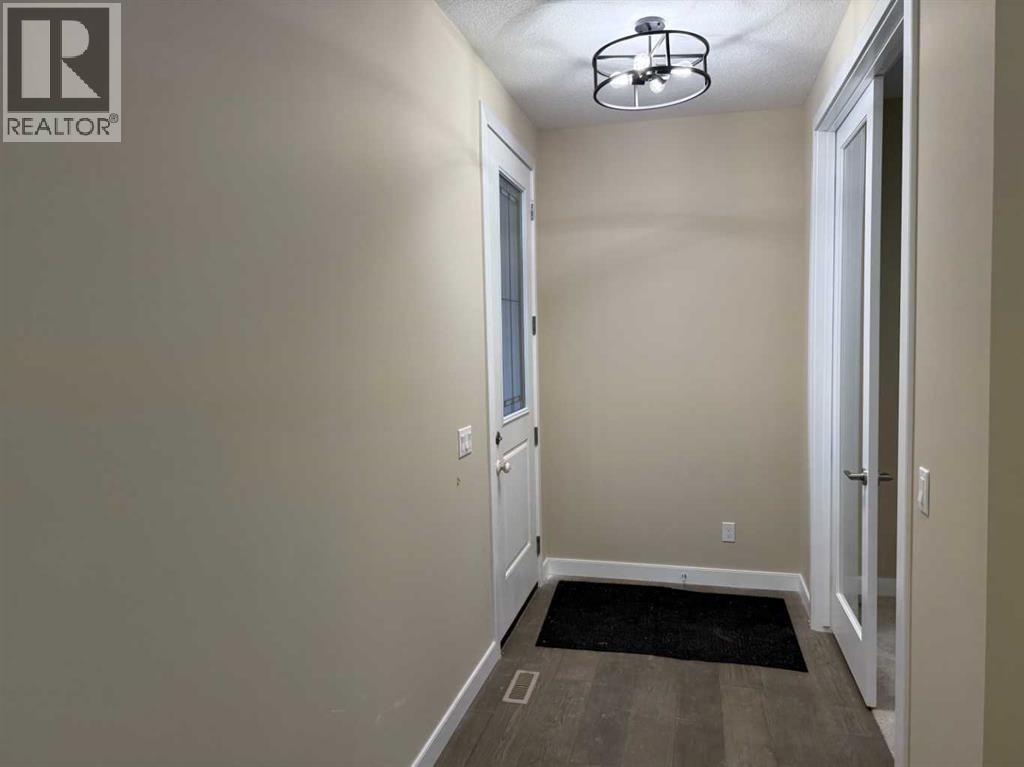 63 Sunrise Heath, Cochrane, Alberta  T4C 3C5 - Photo 3 - A2269947