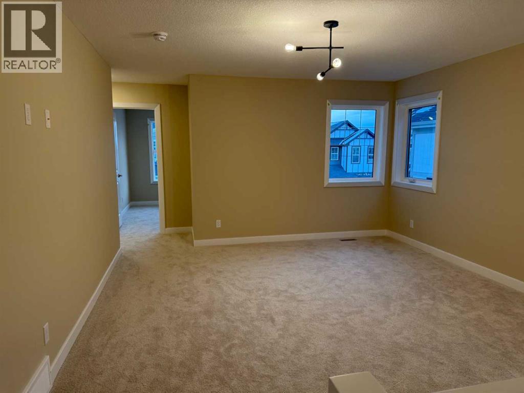 63 Sunrise Heath, Cochrane, Alberta  T4C 3C5 - Photo 22 - A2269947