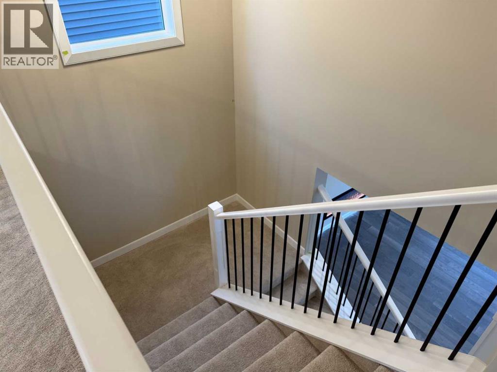 63 Sunrise Heath, Cochrane, Alberta  T4C 3C5 - Photo 19 - A2269947