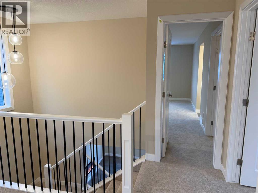63 Sunrise Heath, Cochrane, Alberta  T4C 3C5 - Photo 31 - A2269947