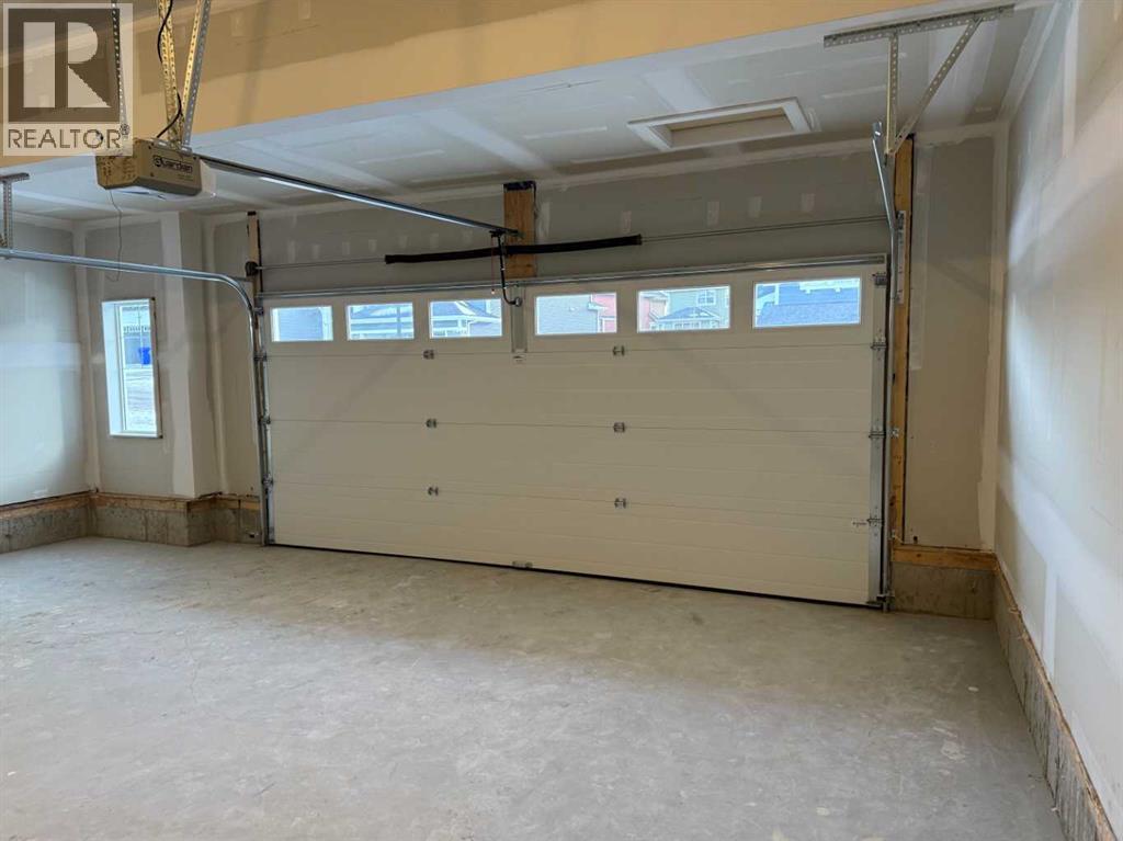 63 Sunrise Heath, Cochrane, Alberta  T4C 3C5 - Photo 41 - A2269947