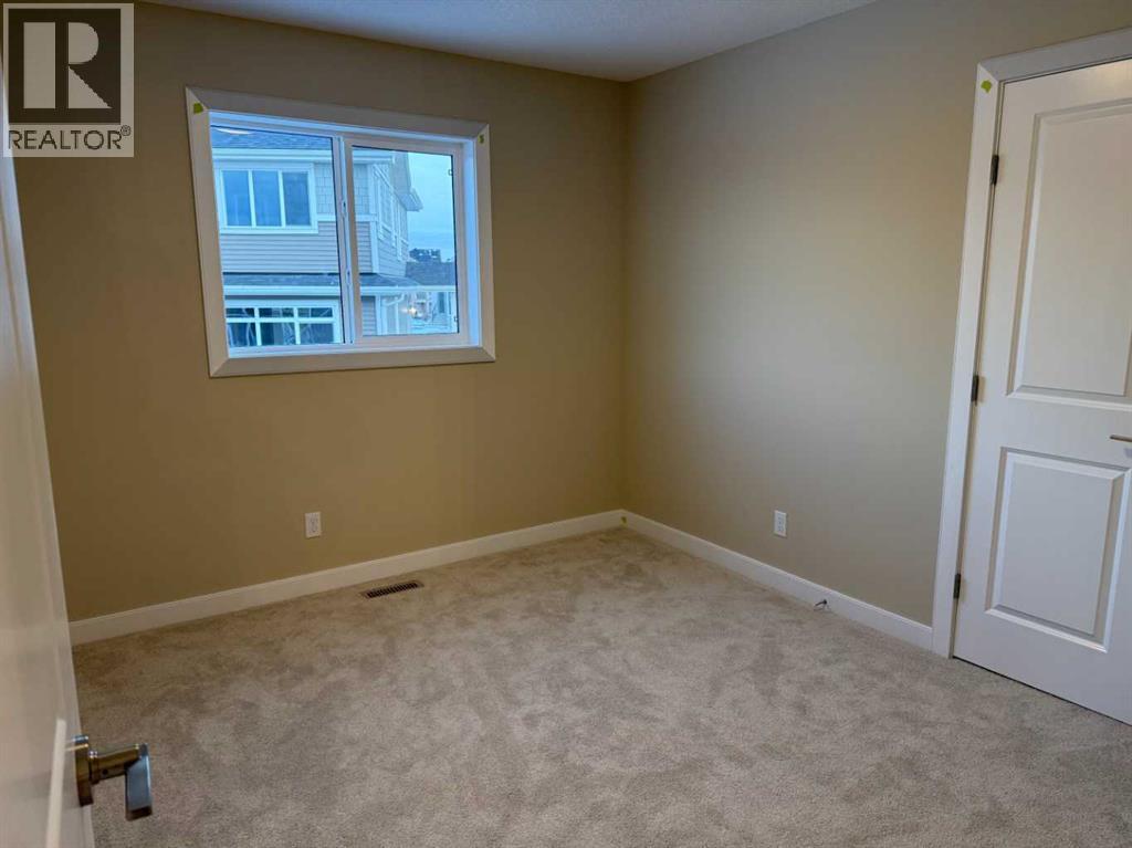 63 Sunrise Heath, Cochrane, Alberta  T4C 3C5 - Photo 21 - A2269947