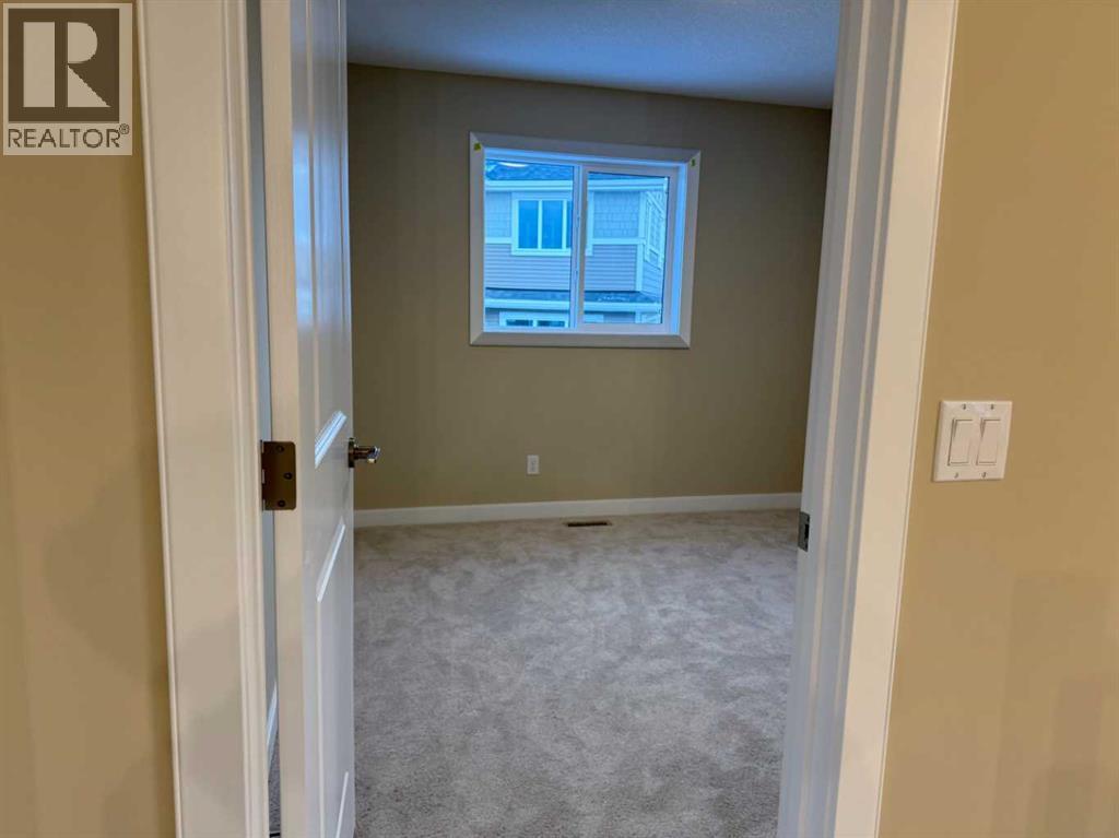 63 Sunrise Heath, Cochrane, Alberta  T4C 3C5 - Photo 20 - A2269947