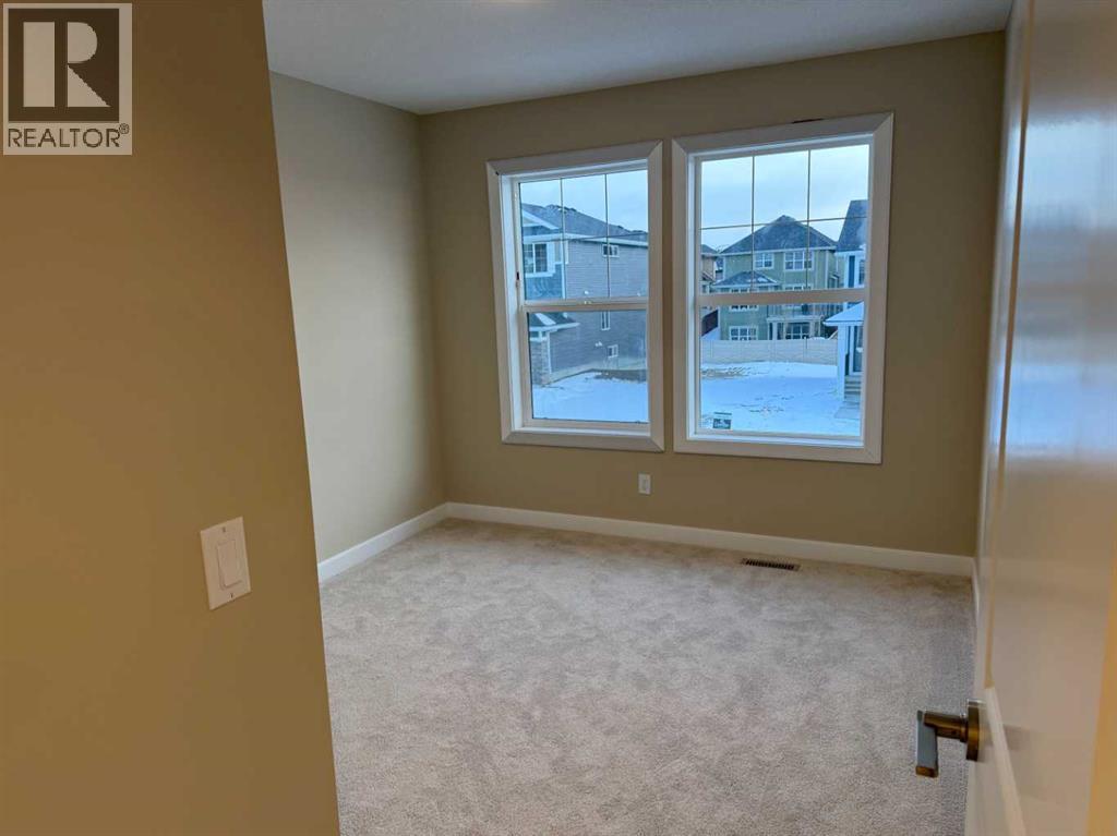 63 Sunrise Heath, Cochrane, Alberta  T4C 3C5 - Photo 26 - A2269947