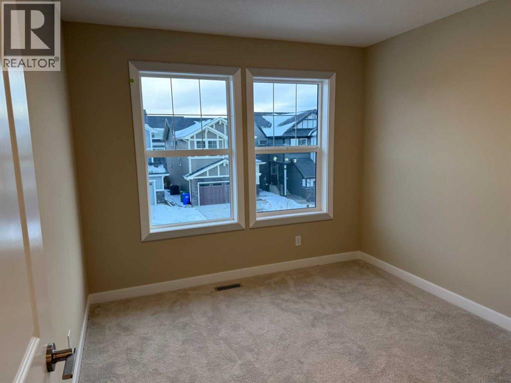 63 Sunrise Heath, Cochrane, Alberta  T4C 3C5 - Photo 24 - A2269947