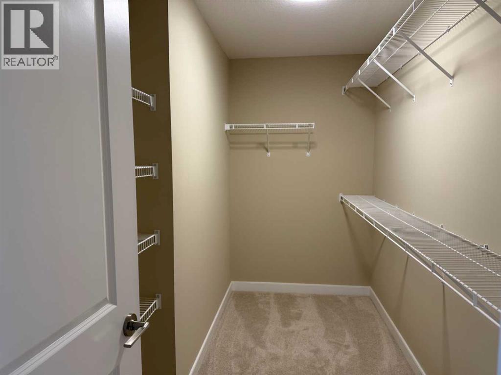 63 Sunrise Heath, Cochrane, Alberta  T4C 3C5 - Photo 34 - A2269947