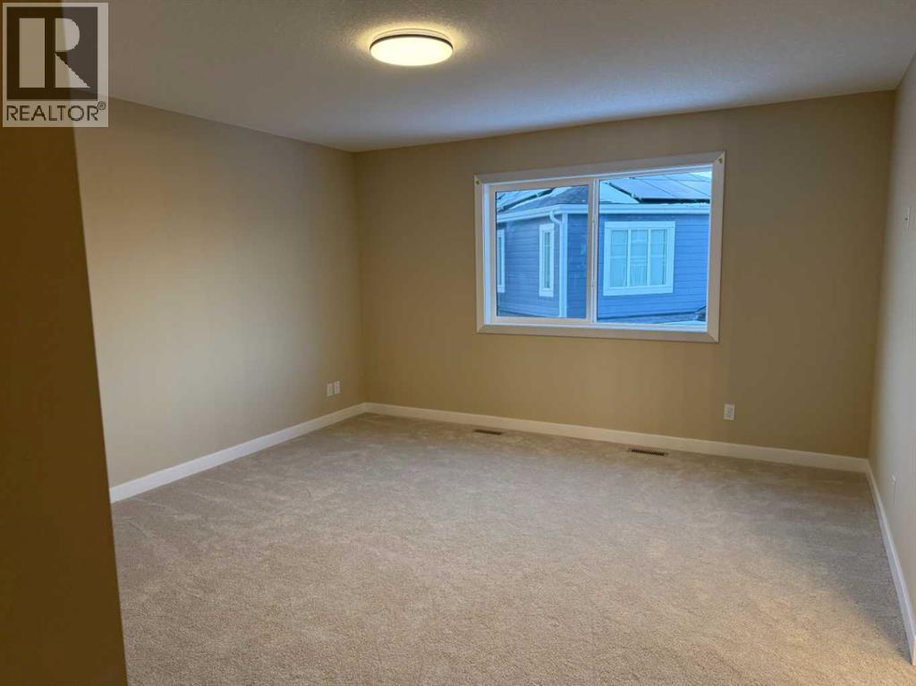 63 Sunrise Heath, Cochrane, Alberta  T4C 3C5 - Photo 32 - A2269947