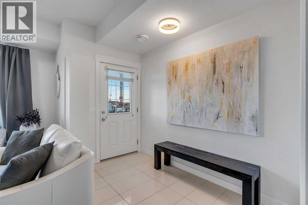 6, 59 West Coach Manor Sw, Calgary, Alberta  T3H 1R7 - Photo 3 - A2284349