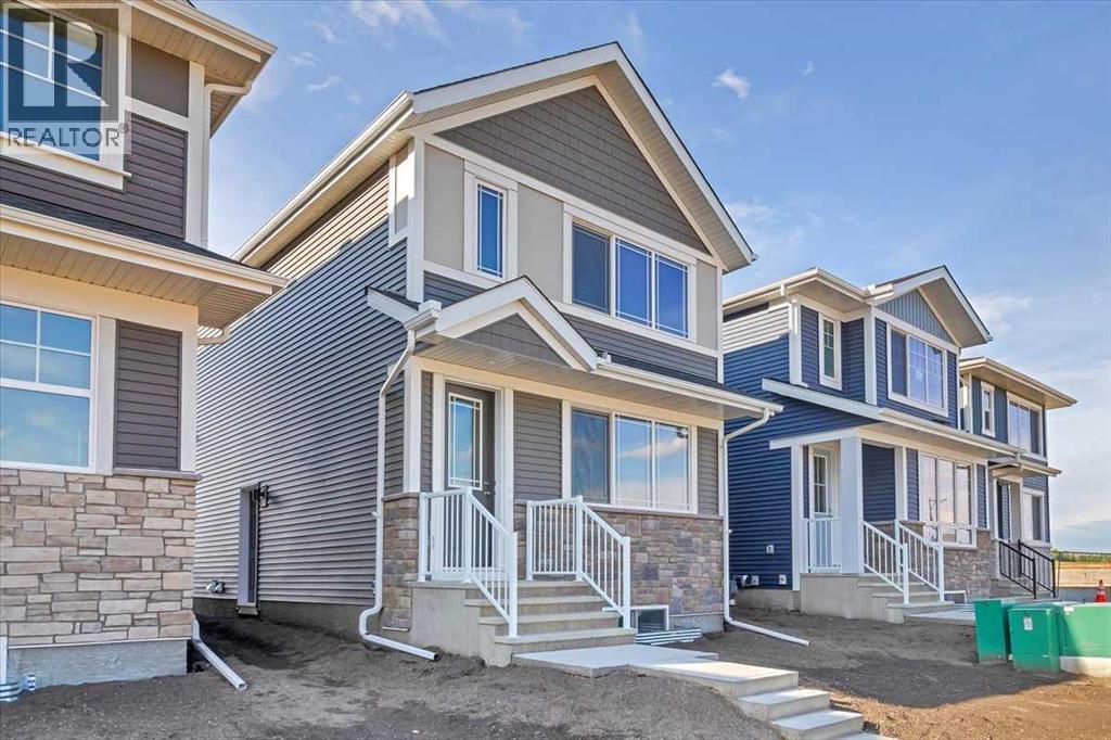 74 Wedderburn Drive, Okotoks, Alberta  T1S 5X2 - Photo 2 - A2277430