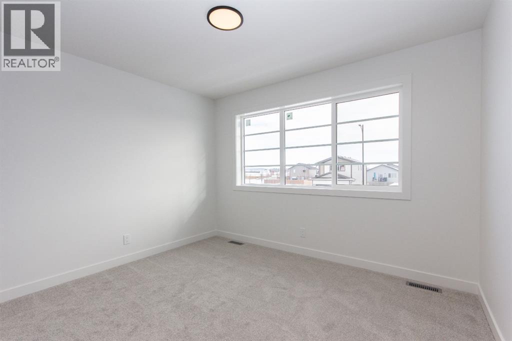 12 Trinity Street, Lacombe, Alberta  T4L 0L1 - Photo 24 - A2282020