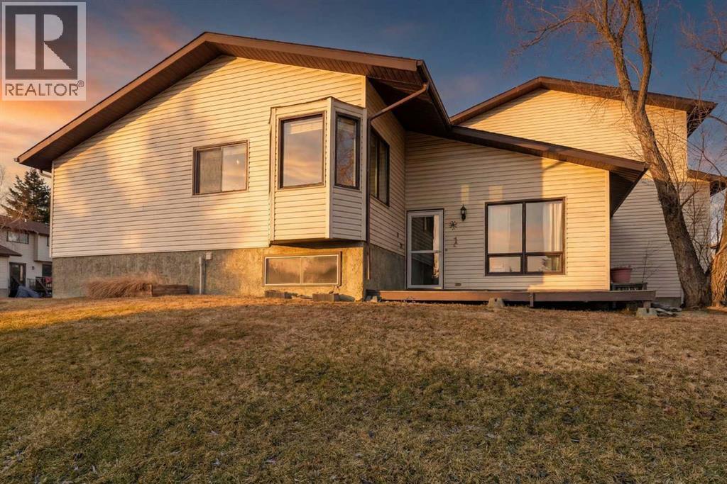 1, 73 Glenbrook Crescent, Cochrane, Alberta  T4C 1G1 - Photo 1 - A2284168