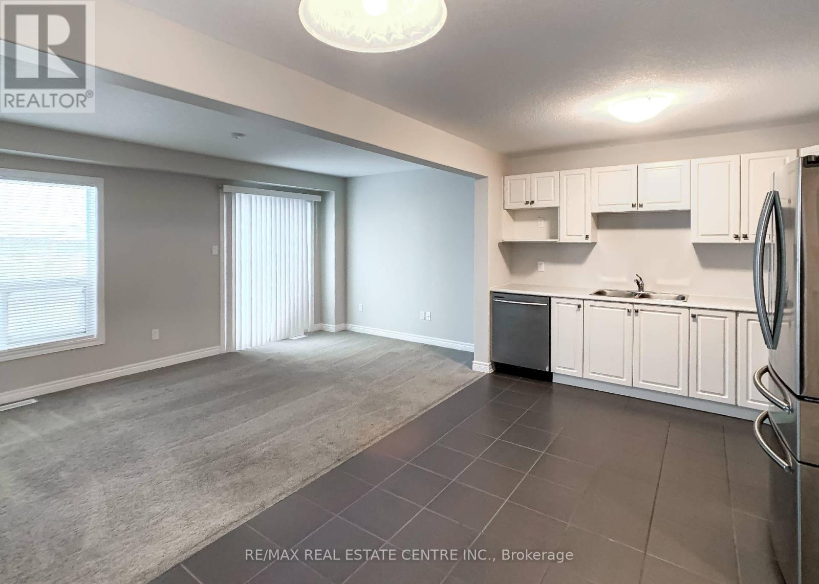 19 - 124 Parkinson Crescent, Orangeville, Ontario  L9W 6X3 - Photo 5 - W12766028