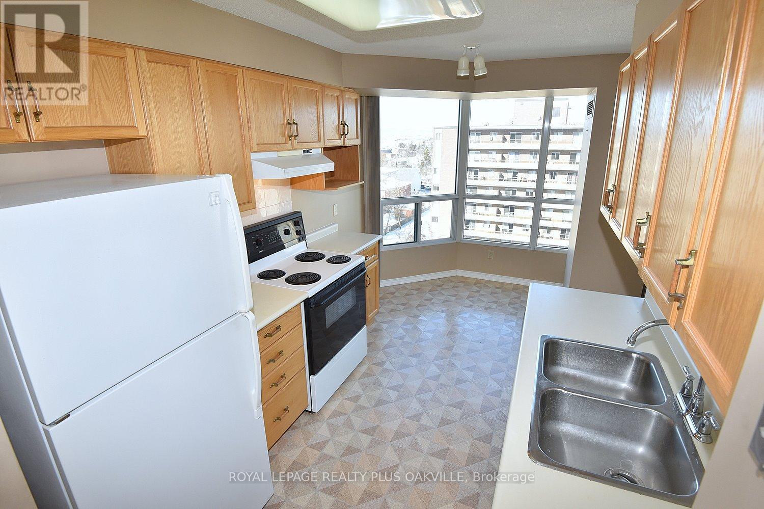 1105 - 100 Millside Drive, Milton, Ontario  L9T 5E2 - Photo 16 - W12766012