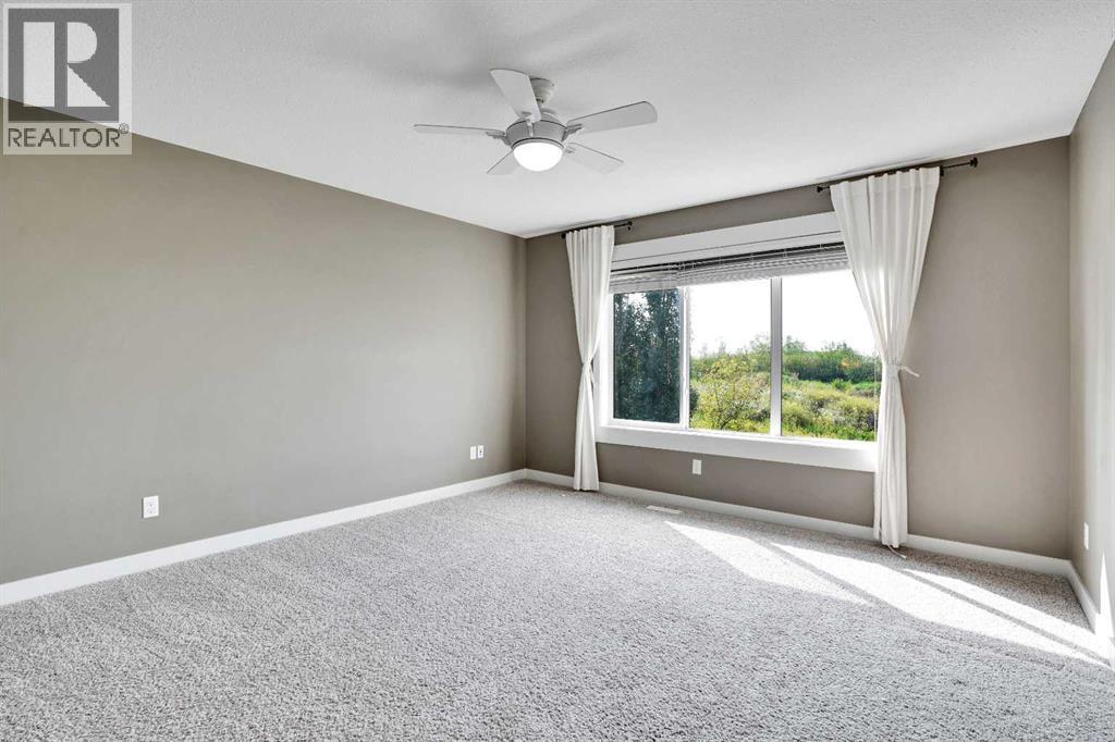 157 Rainbow Falls Boulevard, Chestermere, Alberta  T1X 0N6 - Photo 18 - A2276880