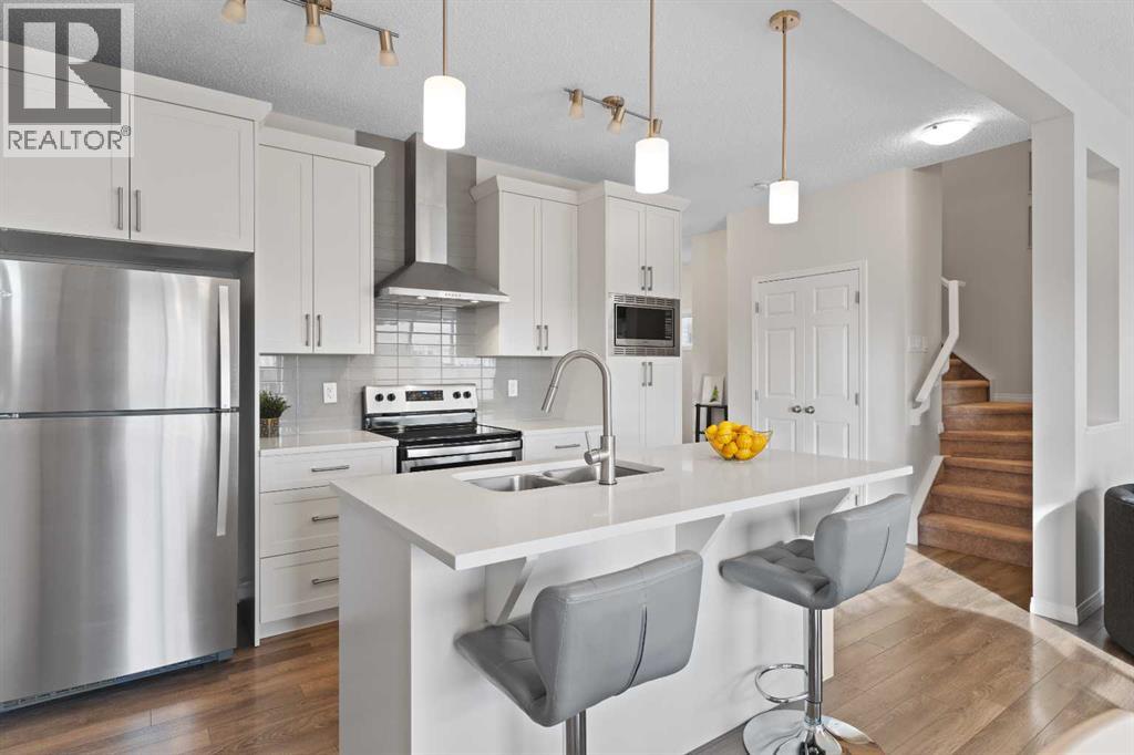 169 Buckskin Way, Cochrane, Alberta  T4C 2R7 - Photo 4 - A2283965