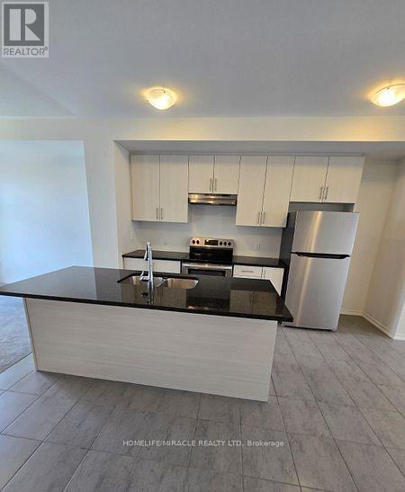 1431 Coral Springs Path, Oshawa, Ontario  L1K 3G1 - Photo 8 - E12766558