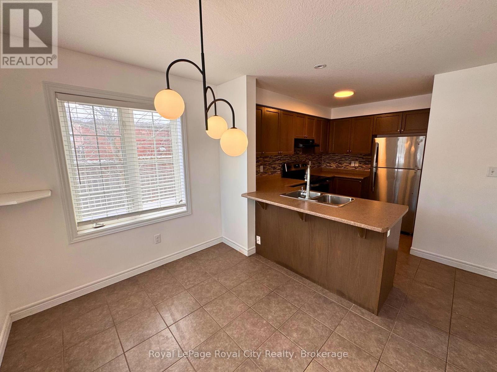 A - 604 Woodlawn Road E, Guelph, Ontario  N1E 0K4 - Photo 4 - X12766808