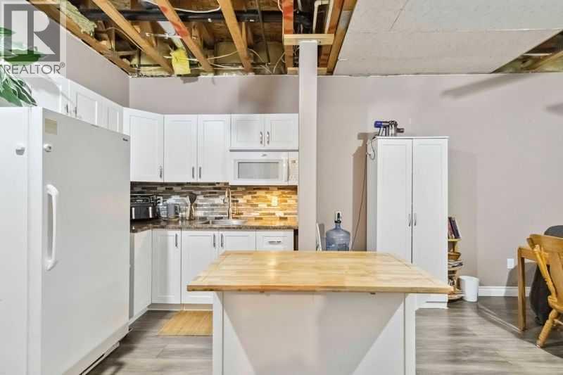 221 Ash Way, Fort Mcmurray, Alberta  T9K 0G2 - Photo 32 - A2231444