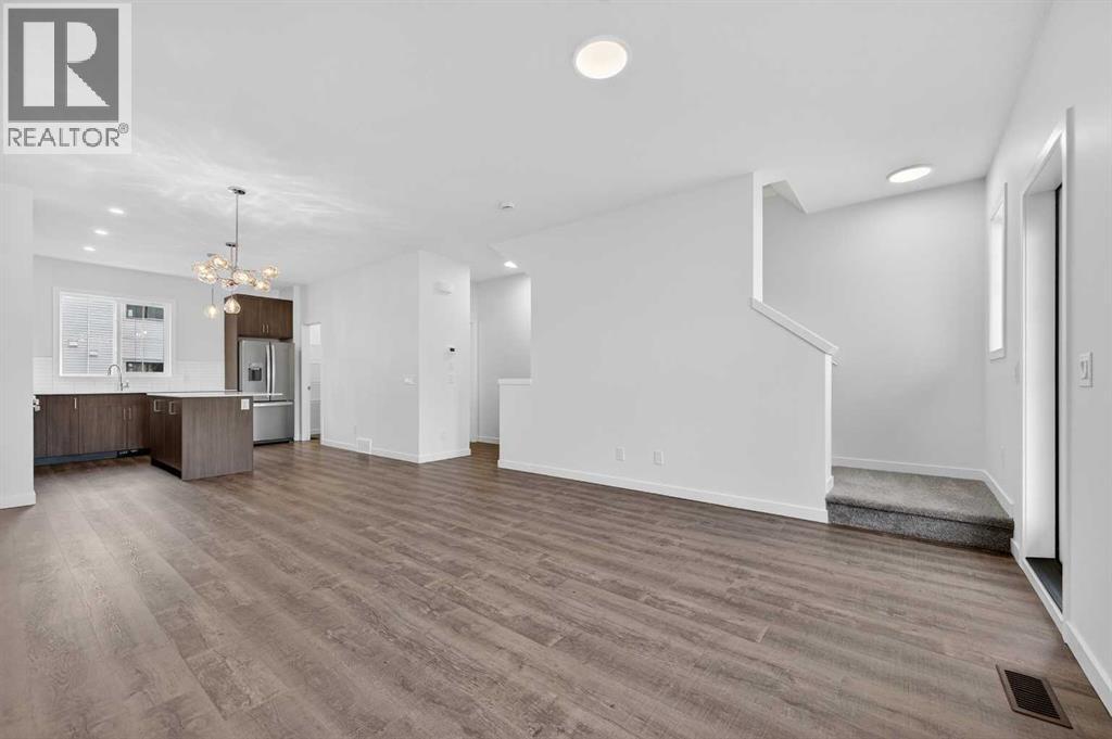 64 Creekside Drive Sw, Calgary, Alberta  T2X 6E2 - Photo 2 - A2282898