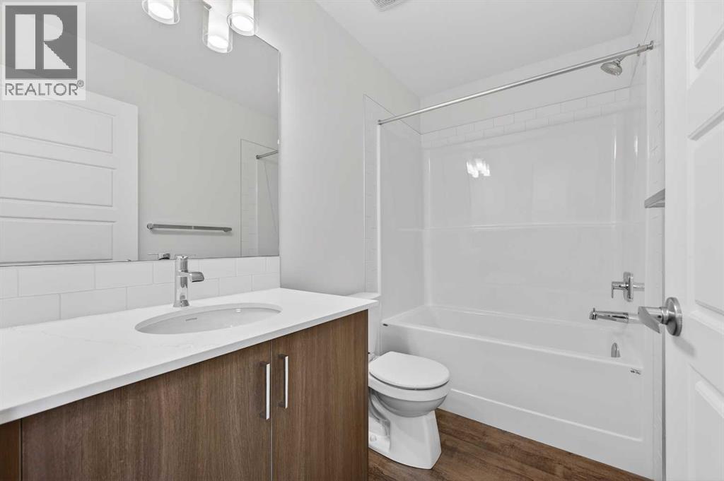 64 Creekside Drive Sw, Calgary, Alberta  T2X 6E2 - Photo 17 - A2282898