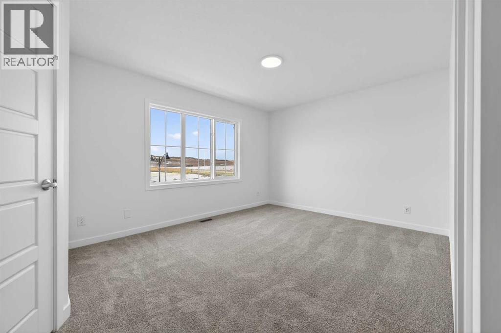 64 Creekside Drive Sw, Calgary, Alberta  T2X 6E2 - Photo 18 - A2282898